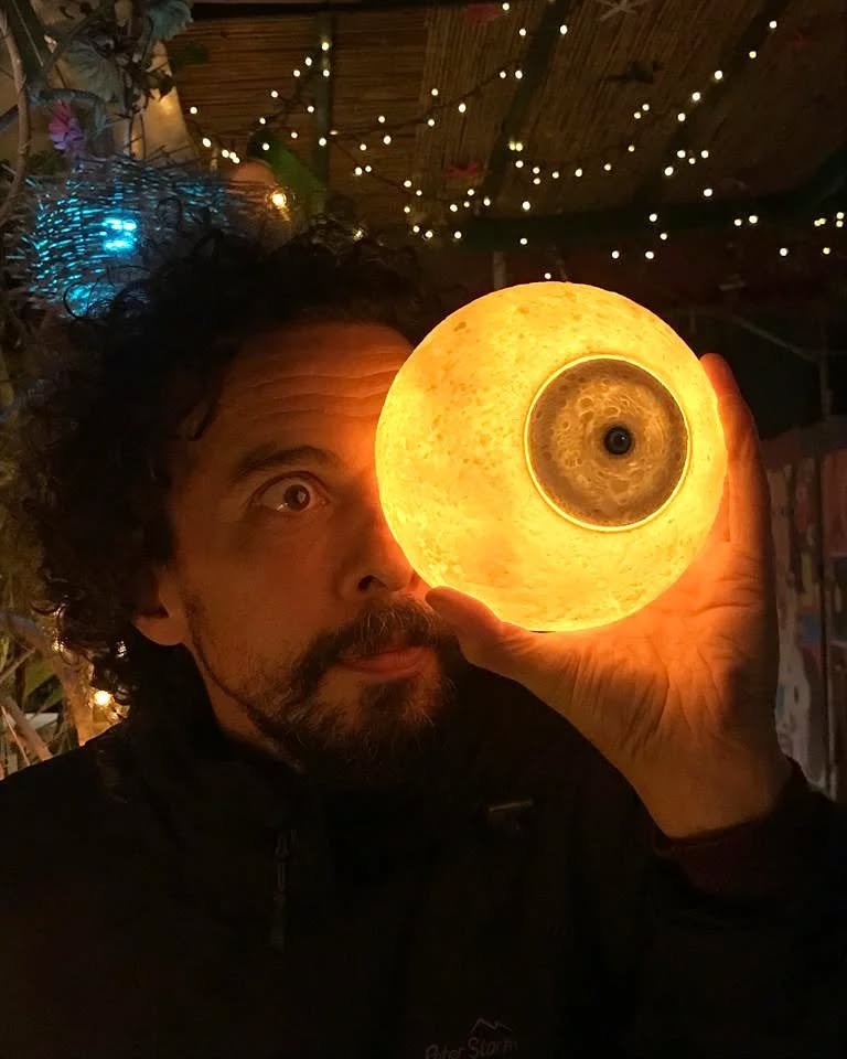 Elliot Mason with a large glowing eyeball
