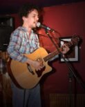 Musical comedian Elliot Mason performing at Slak in Cheltenham in 2010